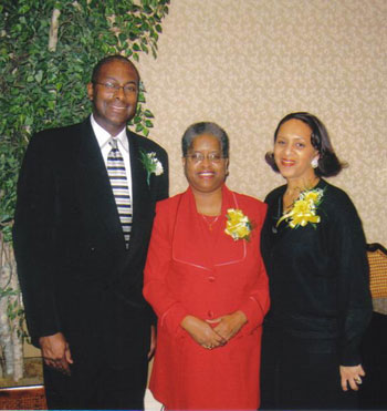 Elder and Mrs. Jeff Chandler with Bishop Dr. Valli [center].